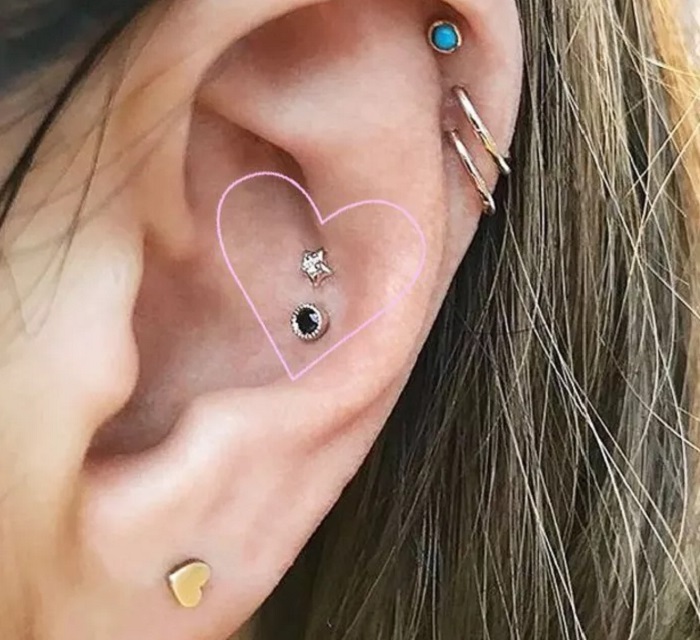 پیرسینگ گوش پیرسینگ غضروف حلزونی گوش (Conch Piercing)
