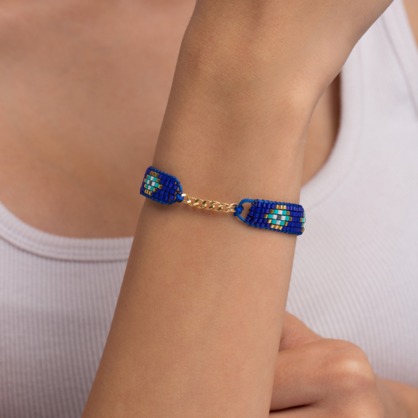 دستبند طلا کارتیه و چشم نظر میوکی